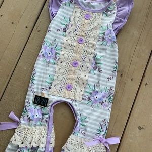Ruffled lilac romper